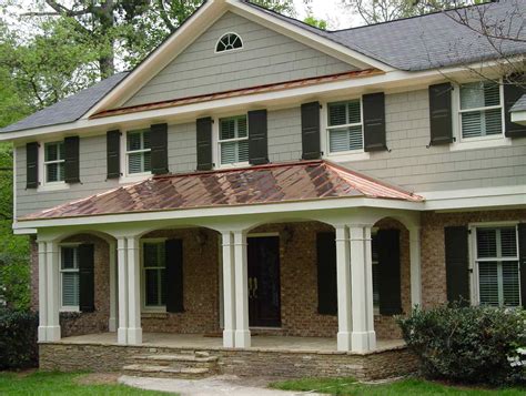 ranch house with metal enclosed porch addition|mountain ranch porch plans.